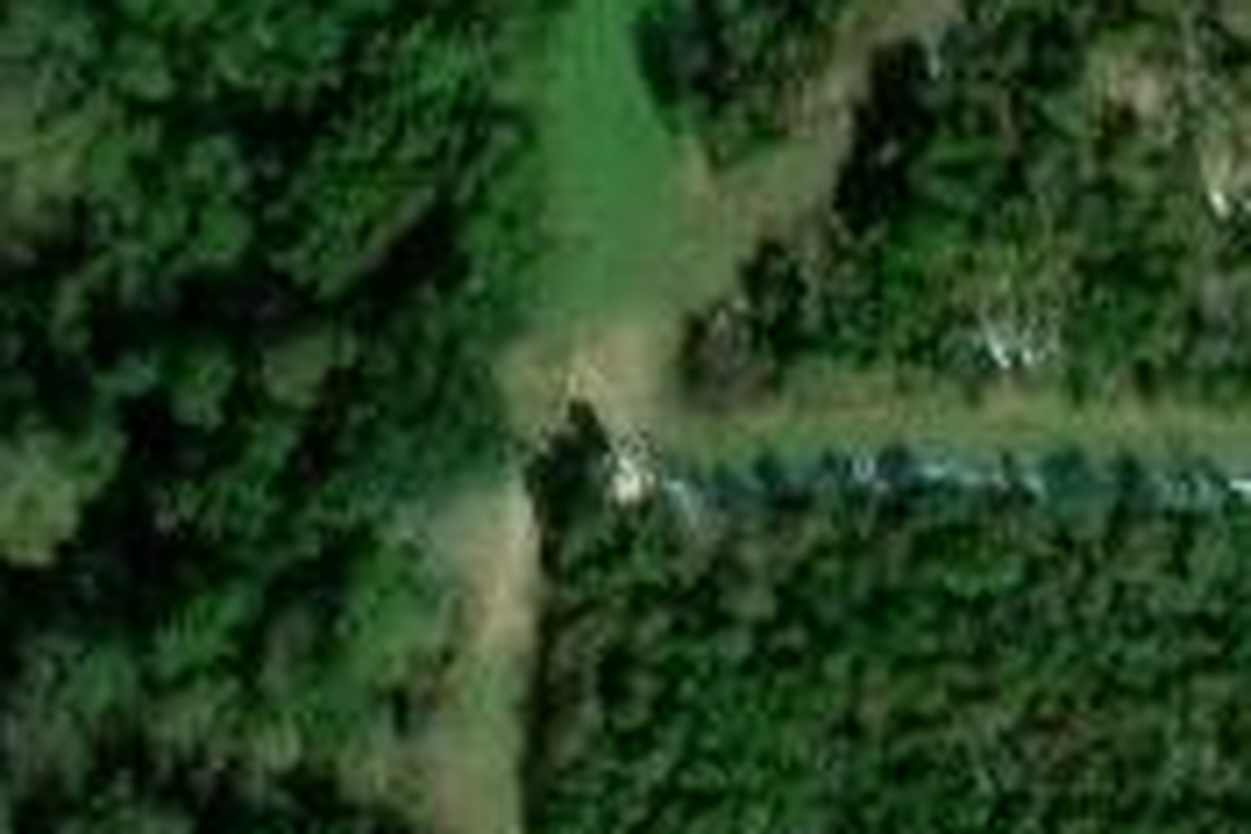 Blurry satellite view of a hunting stand junction where lanes are barely visible
