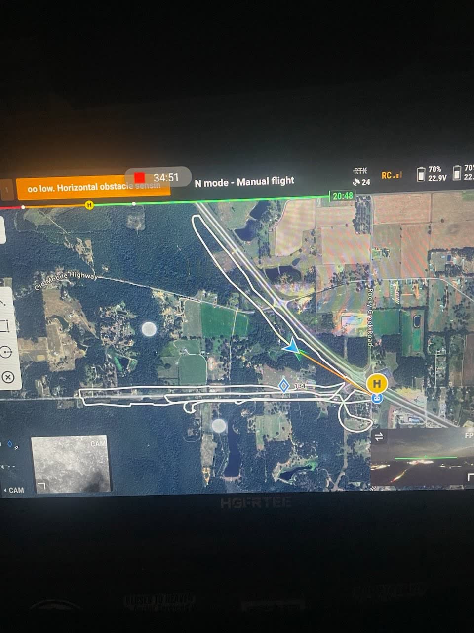 Drone controller screen showing the flight track flown along the Old Mobile Highway corridor, launch point marked with a yellow H